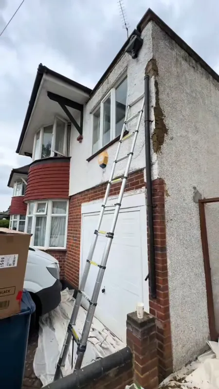 The side wall: cracks repaired and repainted — before