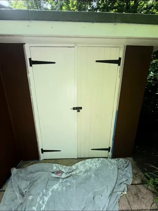 The double doors, painted