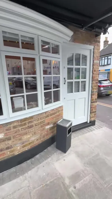 The shopfront windows and door, repainted