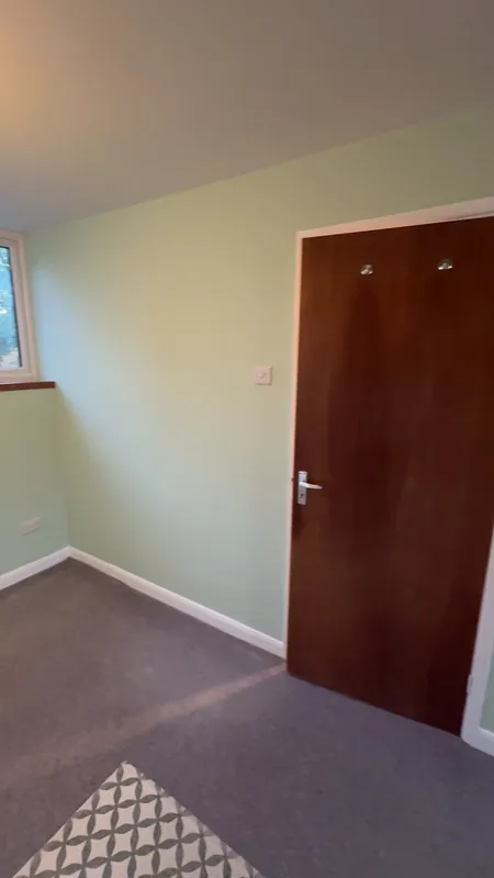 The main bedroom, from the other side — after
