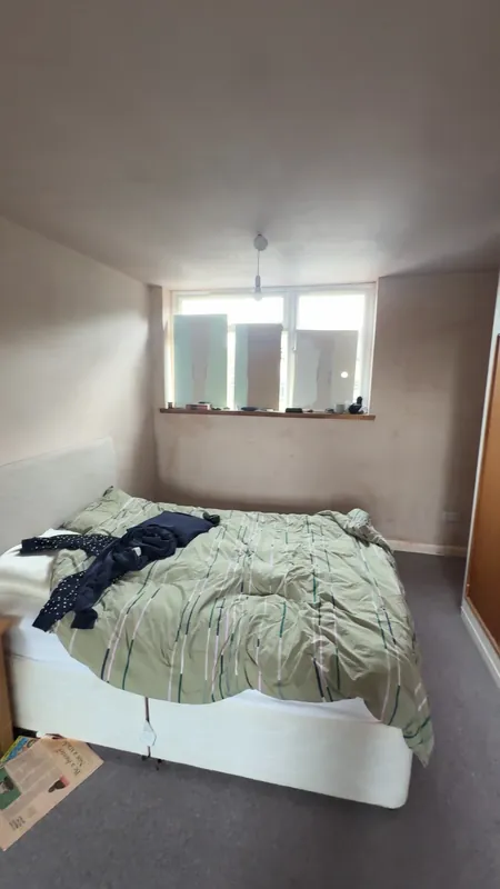 The main bedroom, wardrobe wall — before